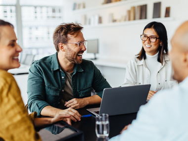 Team mit Freude an der Arbeit